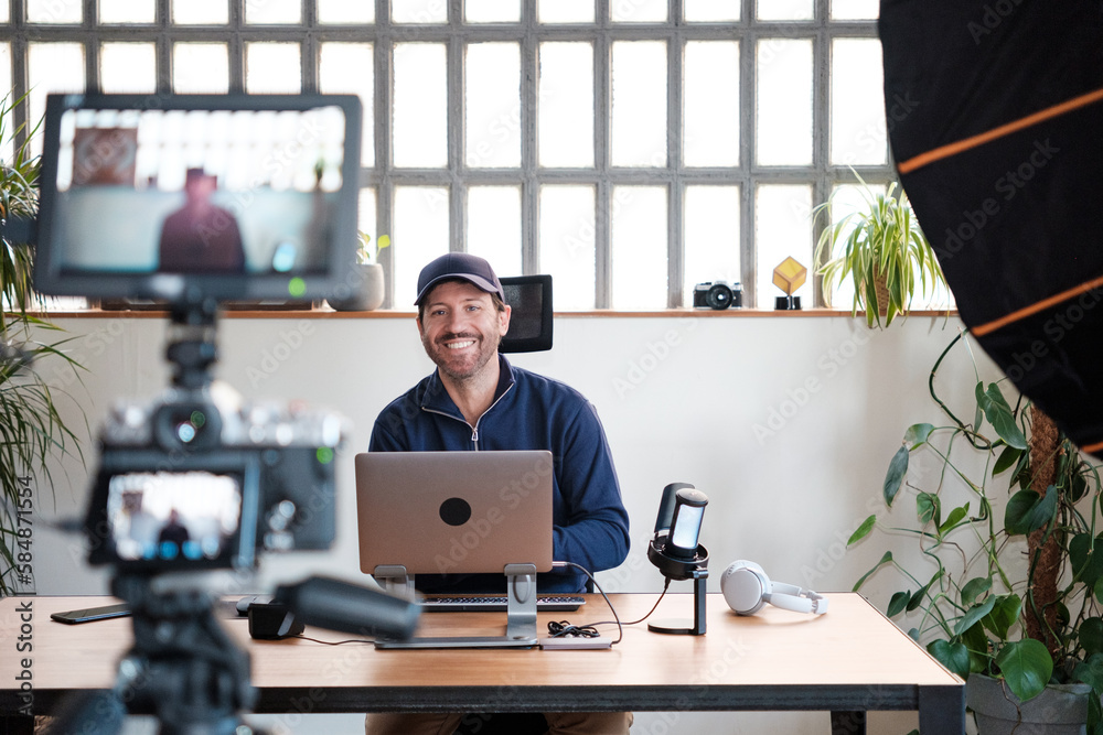 Smiling podcaster man in live streaming Smiling podcaster man in live streaming