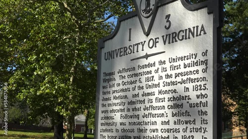 2022 - establishing shot of the Rotunda and historical sign on the University of Virginia campus. photo