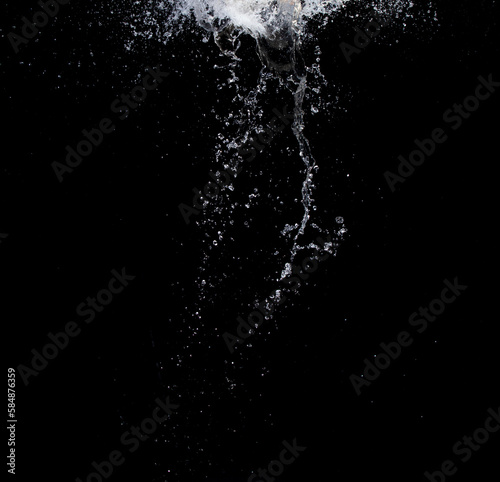 Shape form droplet of Water splashes into drop water attack fluttering in air and stop motion freeze shot. Splash Water for texture graphic resource elements  black background isolated
