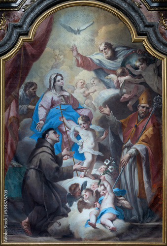 VARALLO, ITALY - JULY 17, 2022: The painting of Madonna among the sainnts in the church Basilica del Sacro Monte by Paolo Cazzinca (1710).
