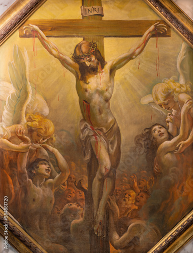 GENOVA, ITALY - MARCH 5, 2023: The painting of Crucifiction and souls of purgatory in the church Chiesa di Santa Maria Maddalena by Mattia Traverso (20. cent.).