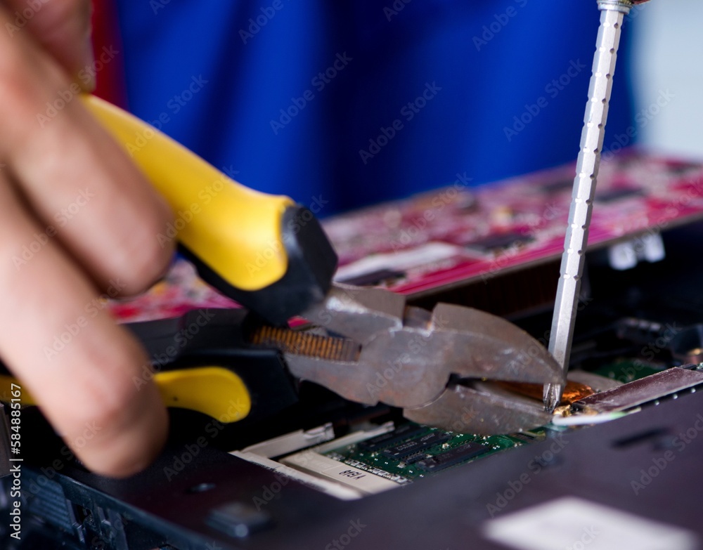 Fototapeta premium Repairman working in technical support fixing computer laptop tr