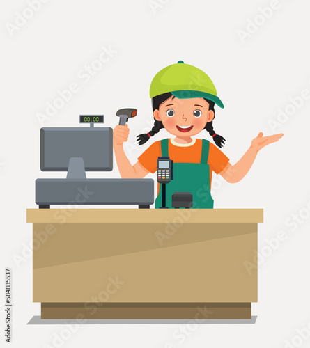 Cute little girl cashier store assistant working at counter holding bar code scanner 