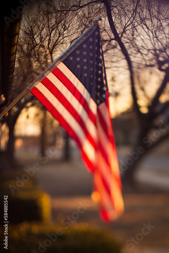 American flag hanging in morning light photo