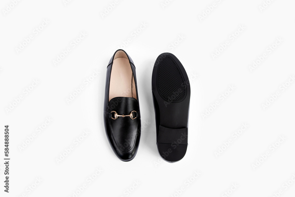 Top view of new pair of leather black stylish woman shoes
