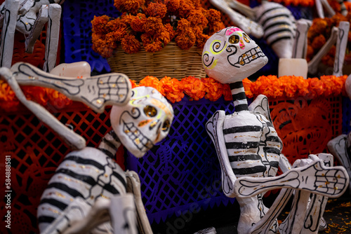 Handmade Papier-Mache skeleton on day of the dead altar in oaxaca photo