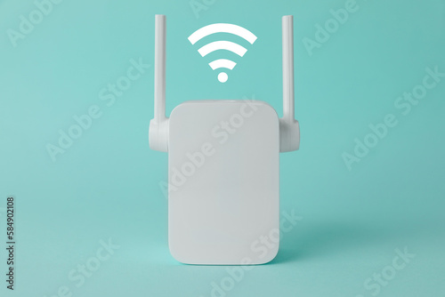 Tableau sur toile New modern repeater and Wi-Fi symbol on turquoise background