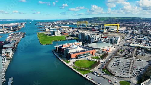Aerial video of Samson and Goliath Cranes at Harland and Wolff Shipyard Dockyard where RMS Titanic was built at Titanic Quarter Belfast Northern Ireland  photo