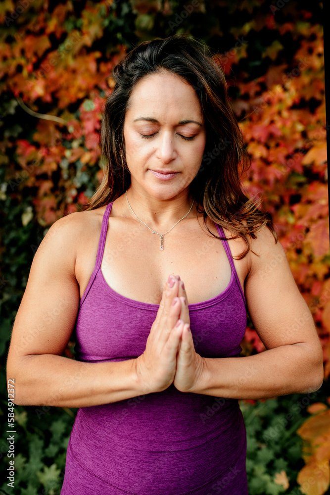 Headshot of woman in purple yoga clothing Headshot of woman in purple yoga clothing