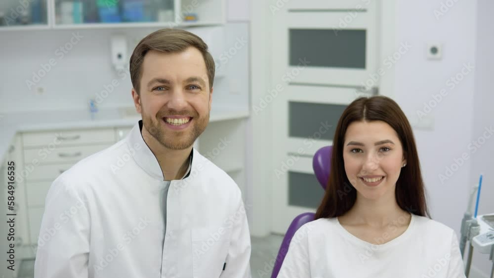 Portrait of a doctor dentist with a young girl patient Portrait of a doctor dentist with a young girl patient