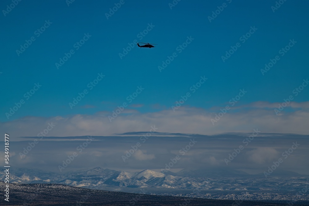 Blackhawk helicopter over the New Mexico Mountains Blackhawk helicopter over the New Mexico Mountains
