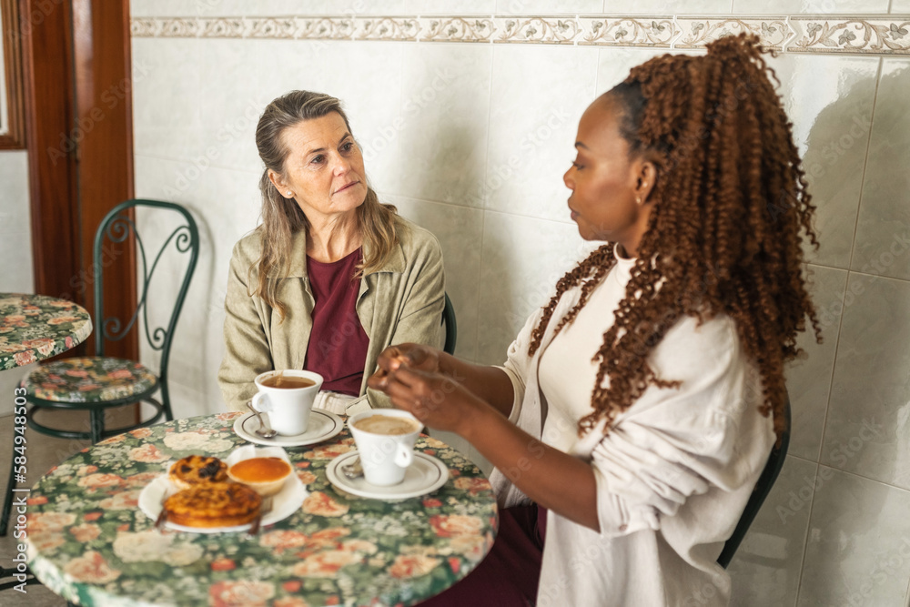 multiracial friends in a coffee shop multiracial friends in a coffee shop