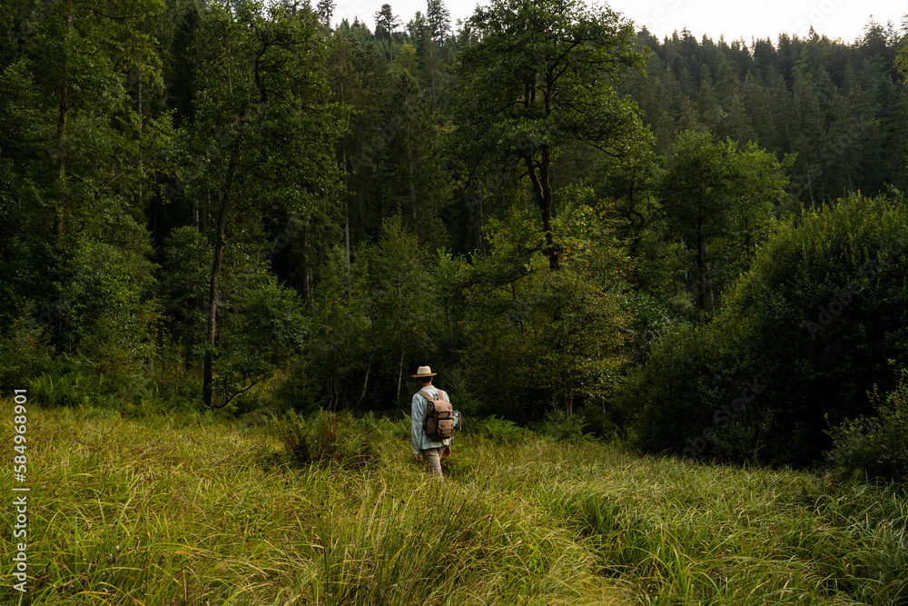 Man on forest path Man on forest path