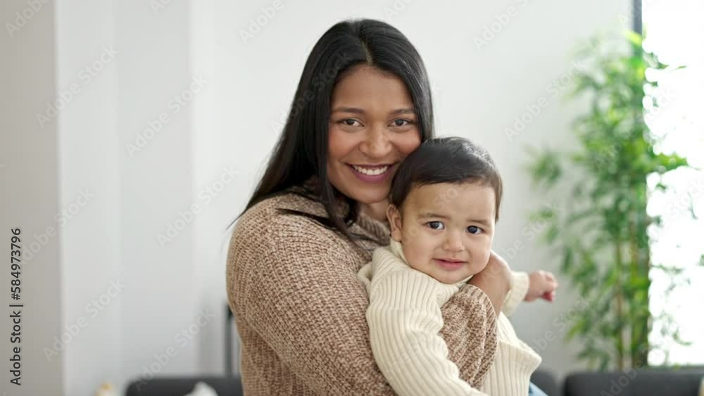 Couple and son hugging each other standing at home Couple and son hugging each other standing at home