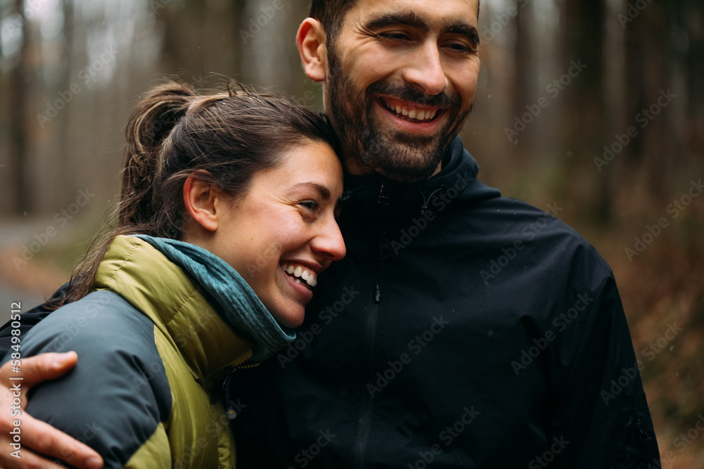 Couple Laughing and Hugging Couple Laughing and Hugging