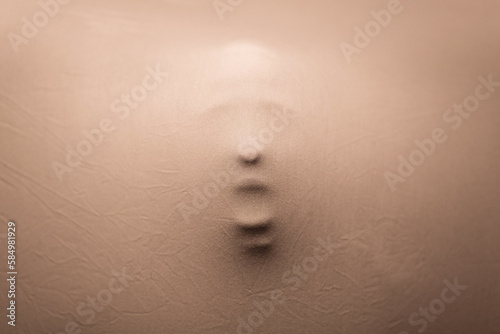 Dreamlike human face with open mouth photo