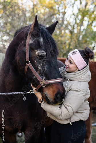 Teen girl and her horse with skin cancer