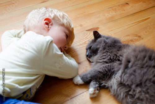 blondy boy with cat  photo