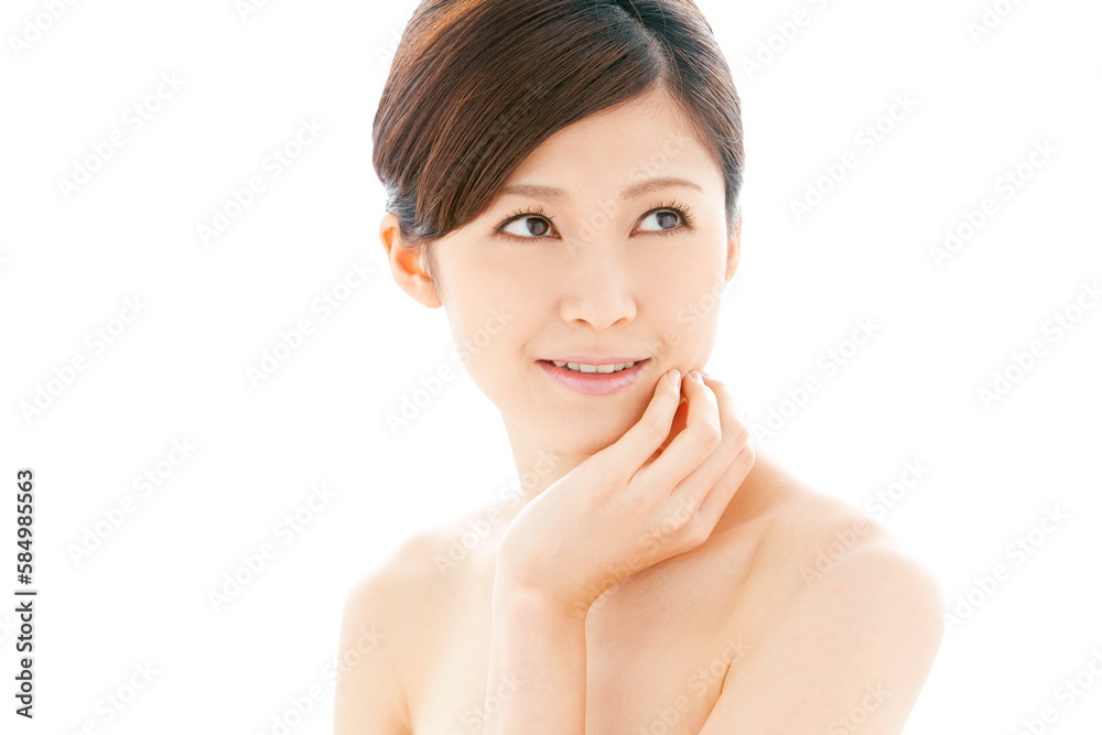 頬を押さえる女性
頬を押さえる女性