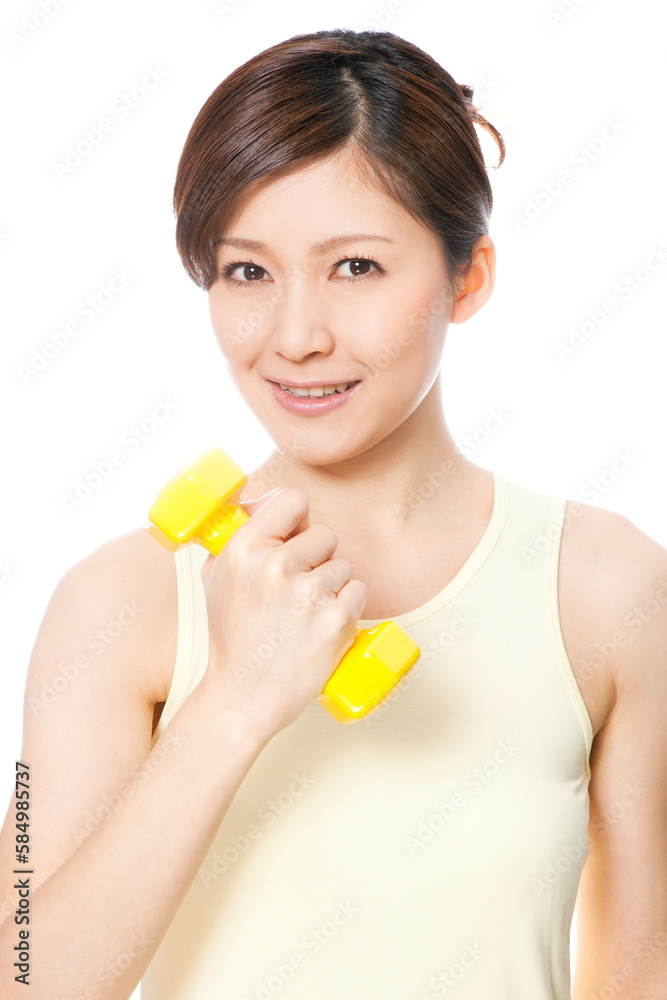 ダンベルを持つ女性
ダンベルを持つ女性