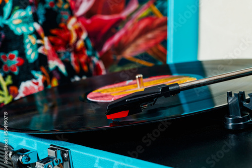 record in a retro blue turntable
