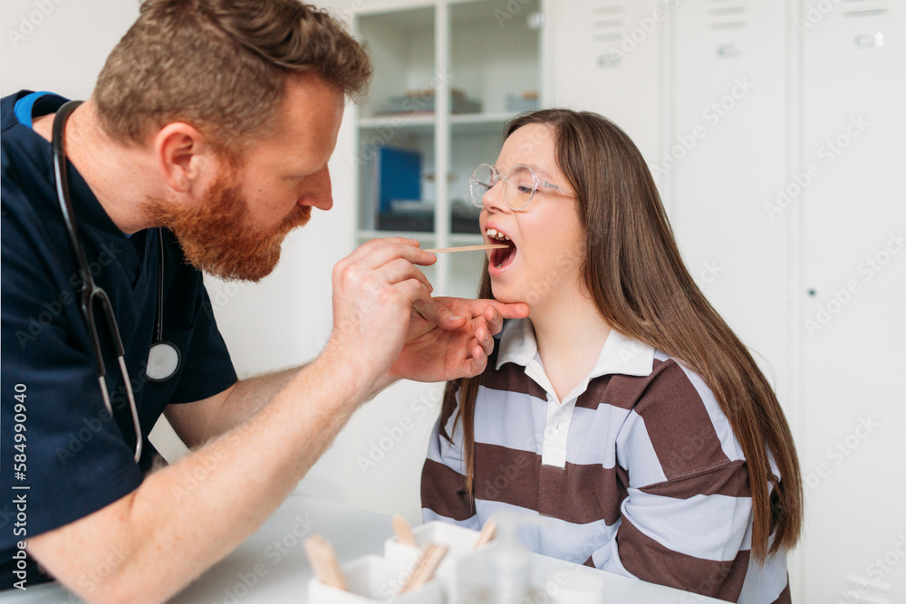 Physician Examining Young Woman's Throat 