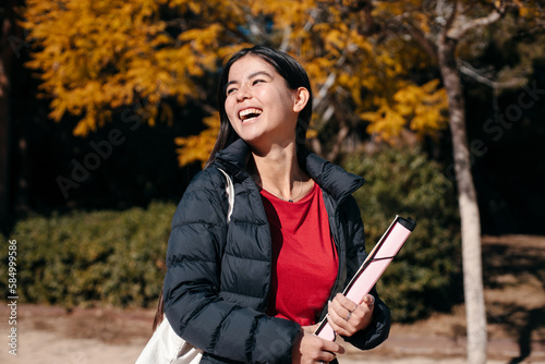 Portrait of a happy and confident Chinese student