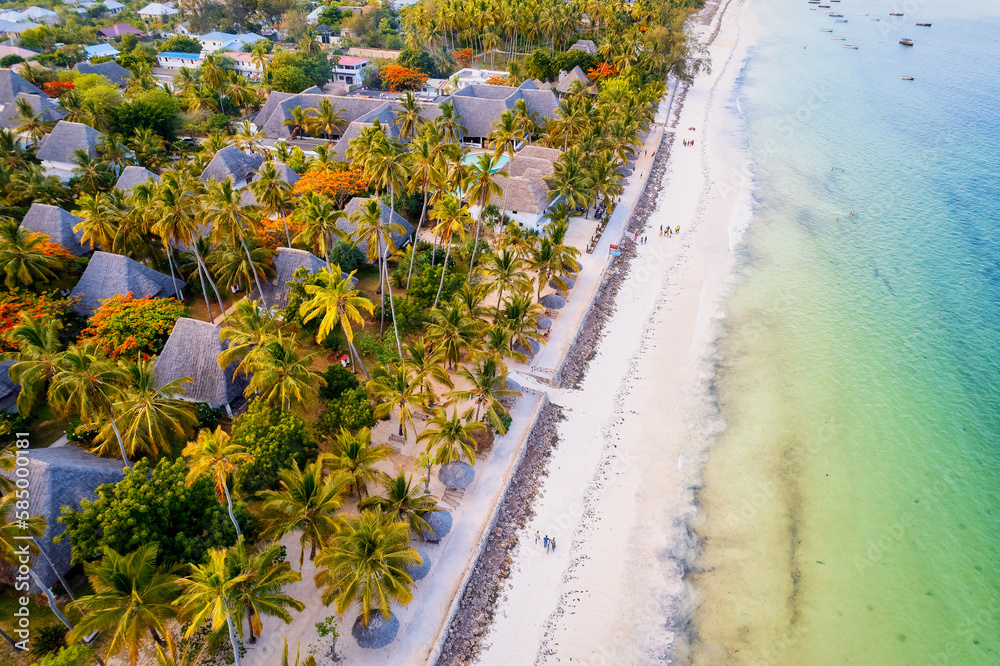Indulge in the sheer beauty of Zanzibar Beach, with its turquoise waters and pristine white sands that offer a perfect backdrop for romantic getaways and family vacations.