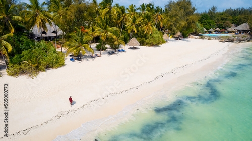 Fototapeta Naklejka Na Ścianę i Meble -  The aerial view of the Zanzibar Island coast is a sight to behold, with its pristine beaches and turquoise waters.