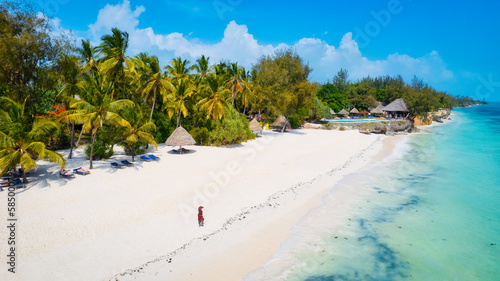 The beach on the Zanzibar Island coast is stunning, with crystal-clear waters and soft, golden sand.