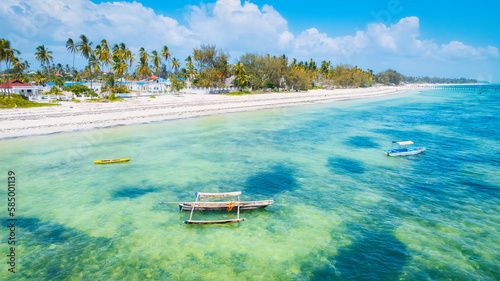 The white sandy beaches of Zanzibar are the ideal spot for spending lazy Zanzibar beach summers. photo