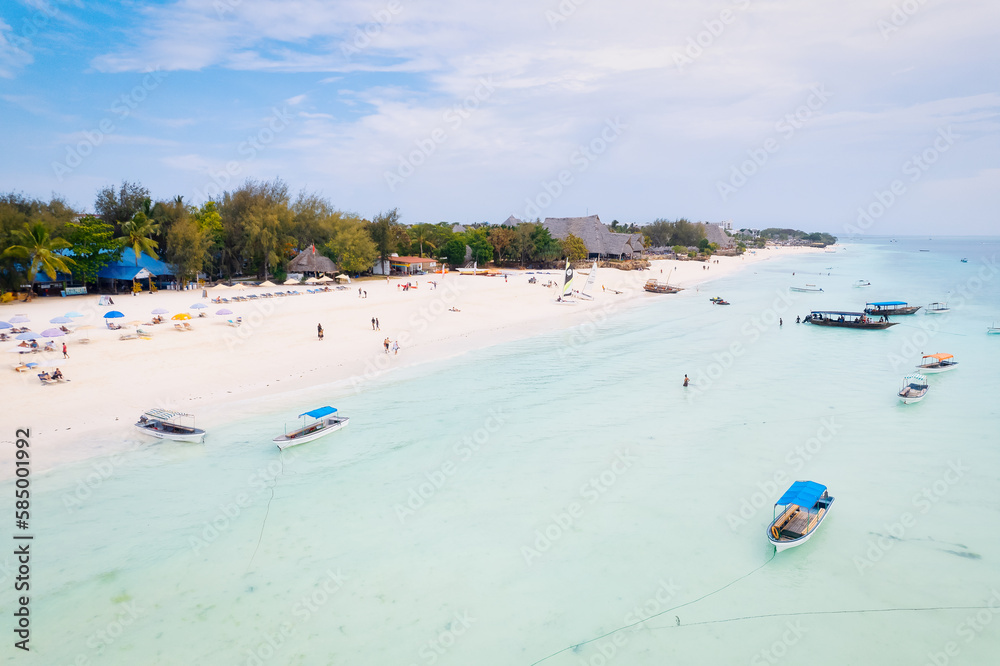 The aerial view of the Zanzibar Island coast is a sight to behold, with its pristine beaches and turquoise waters. The aerial view of the Zanzibar Island coast is a sight to behold, with its pristine beaches and turquoise waters.