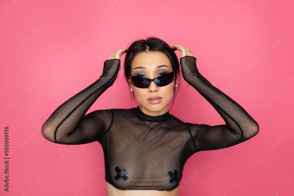 Stylish Asian woman in black sunglasses Stylish Asian woman in black sunglasses