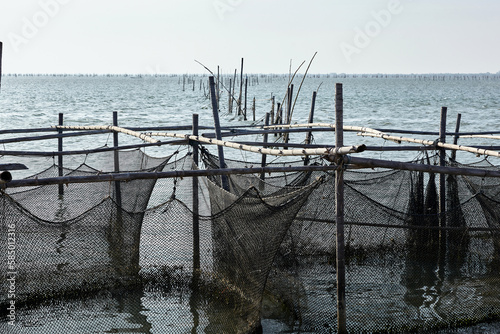 The old fish cage in the sea