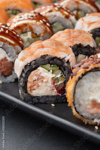 Variety of sushi foodTraditional asian food with raw fish and rice. All you can eat concept