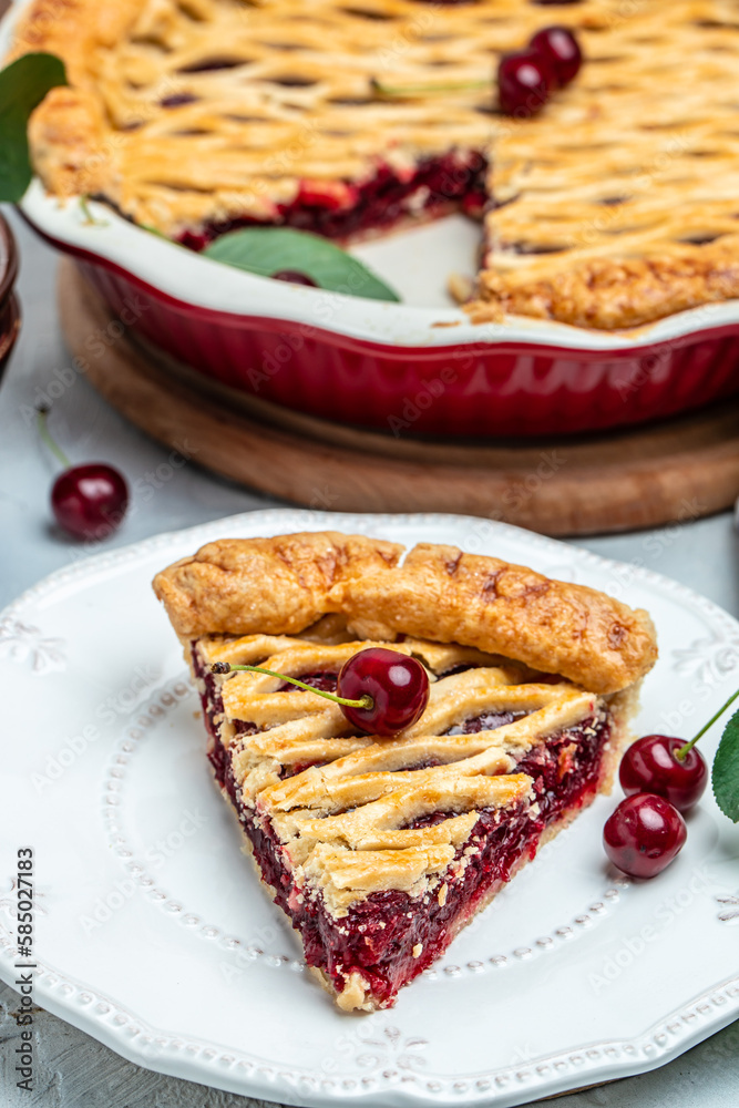 cherry pie, Flaky Crust, piece on a plate and the whole homemade cherry pie, place for text, top view cherry pie, Flaky Crust, piece on a plate and the whole homemade cherry pie, place for text, top view