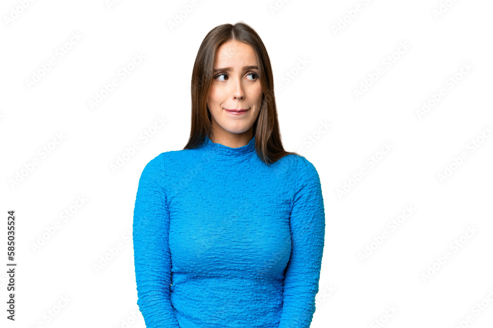Young beautiful woman over isolated chroma key background having doubts while looking up Young beautiful woman over isolated chroma key background having doubts while looking up