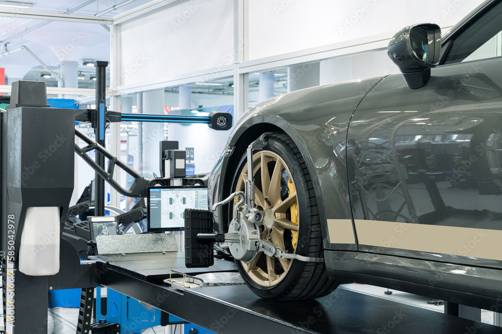 Fototapeta premium Wheel alignment in car service