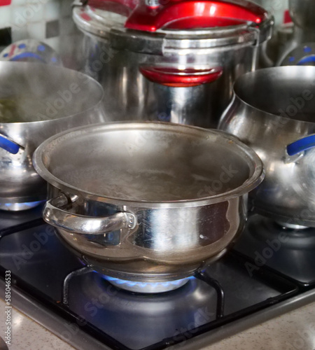 dishes cooked in a pot on the gas stove,