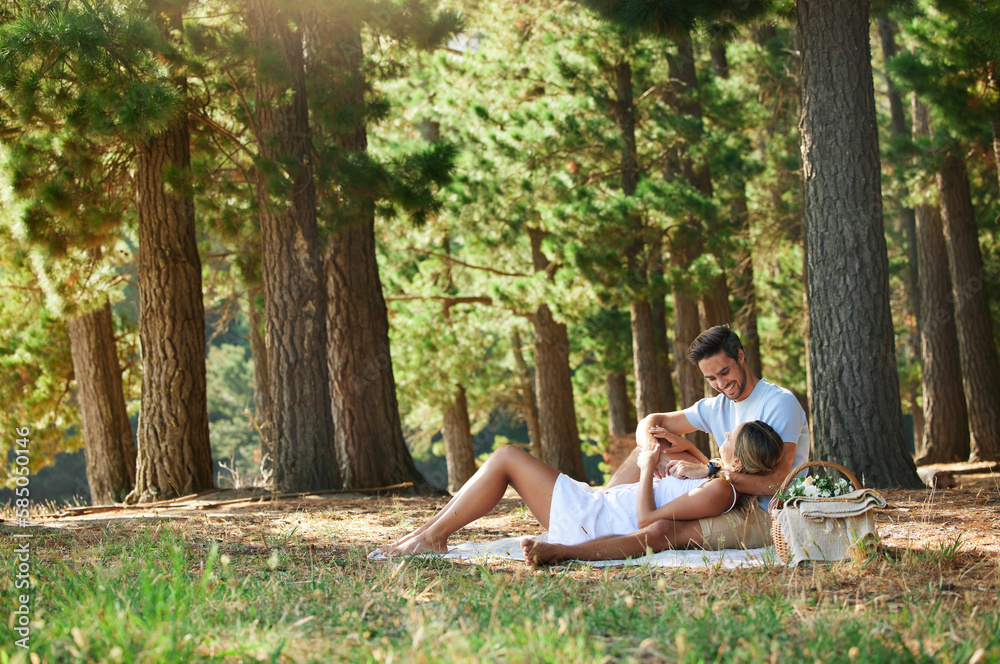 Couple on picnic, nature park and relax together outdoor, support and comfort with love and care while bonding. Summer, holiday with man and woman cuddle, happiness and relationship with trust Couple on picnic, nature park and relax together outdoor, support and comfort with love and care while bonding. Summer, holiday with man and woman cuddle, happiness and relationship with trust