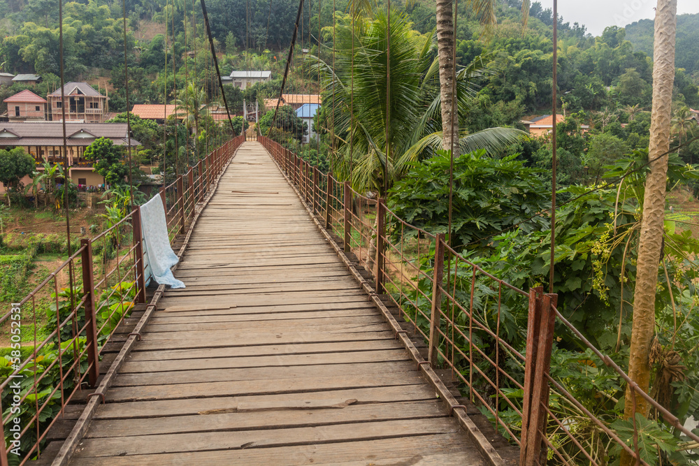 Fototapeta premium Suspension foot bridge in Muang Khua town, Laos