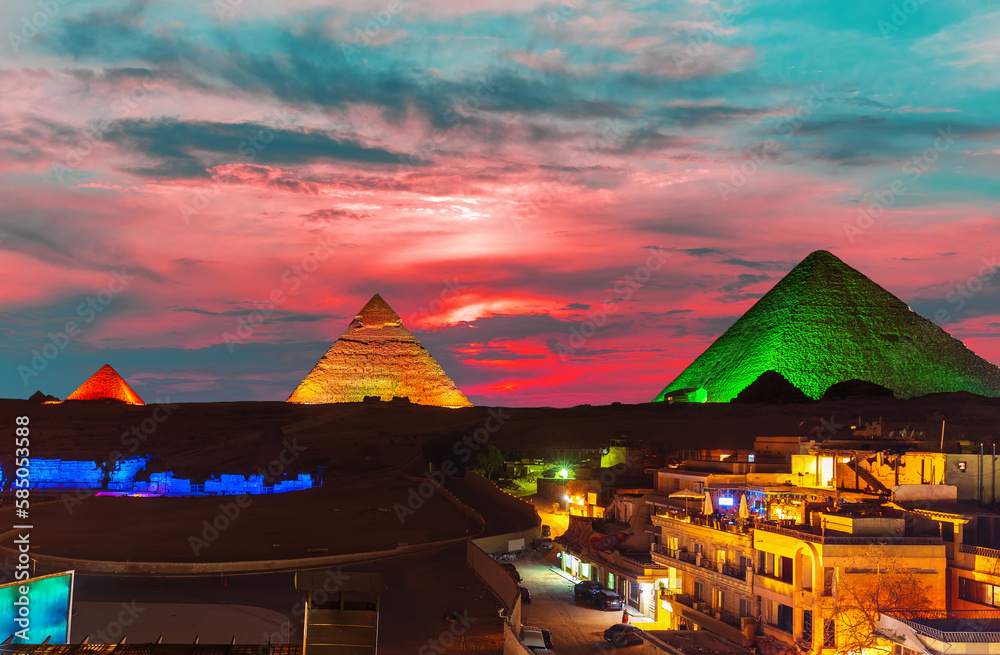 The Great Pyramid complex enlighted at night, Giza, Egypt
