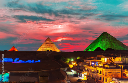 Obraz na płótnie The Great Pyramid complex enlighted at night, Giza, Egypt w salonie