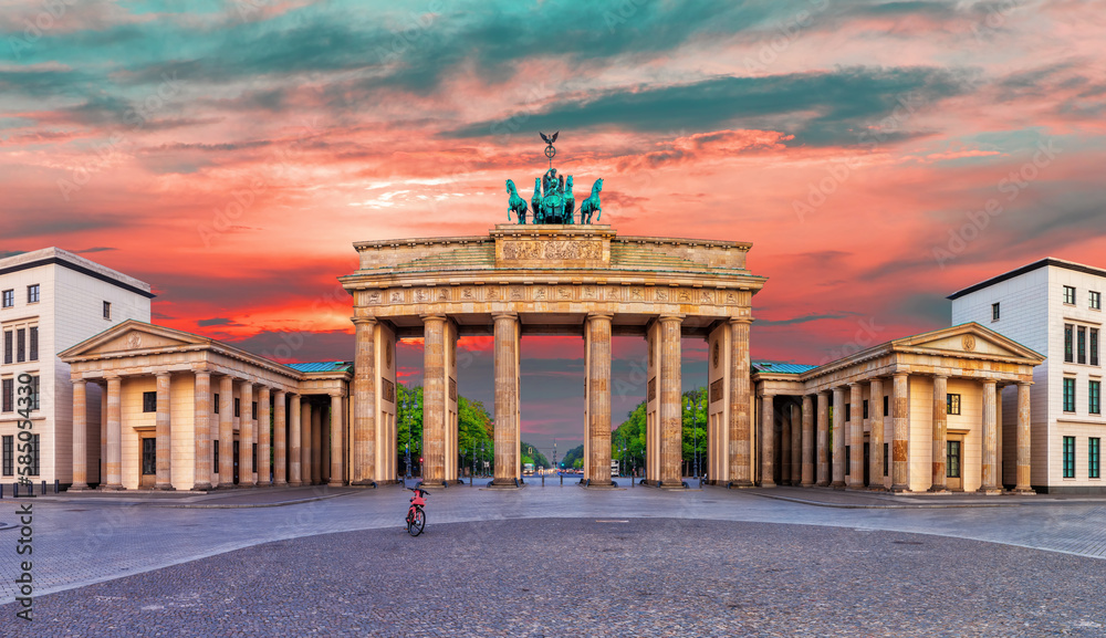 Famous Panorama of Brandenburg Gate or Brandenburger Tor at sunrise, Berlin, Germany