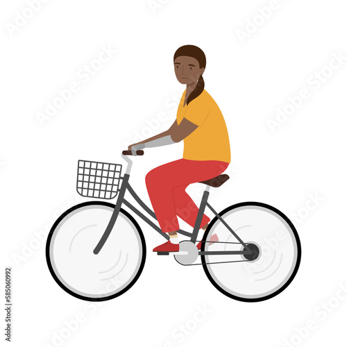 Young woman with a prosthetic arm riding a bicycle. Handicapped person