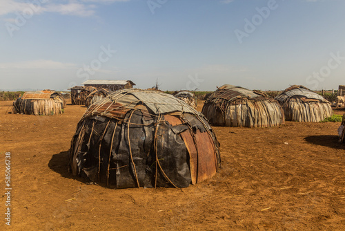 Daasanach tribe village near Omorate, Ethiopia photo