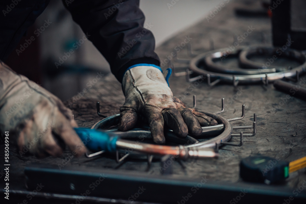 Close up of the steel welding process. Work in the heavy steel industry Close up of the steel welding process. Work in the heavy steel industry