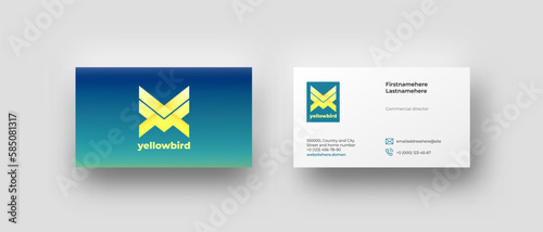 Bright business card top view mockup with geometrical yellow logo and blue background, mail and phone icons. Triangle sigh for corporate identity minimalistic style