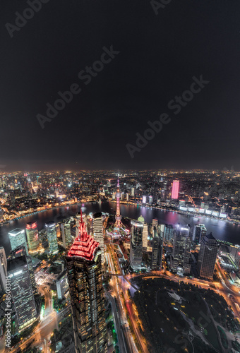 Shanghai skyline and cityscape at night. 