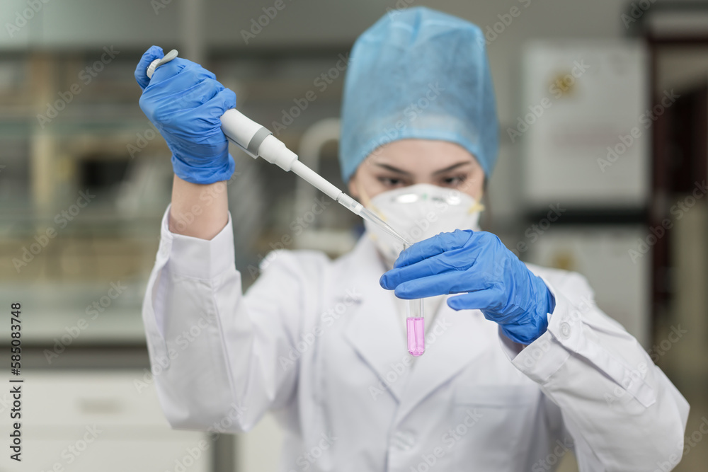 Female scientist working in the laboratory. Female scientist working in the laboratory.